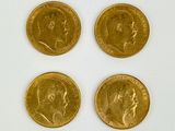 four gold sovereigns, one of which is a sovereign and one of which is a sovereign