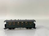 a close up of a toy train car on a white surface