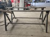 an image of a table made of steel and wood
