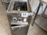 an image of a kitchen with a stove and a sink