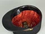 a black hat with a red ribbon around it