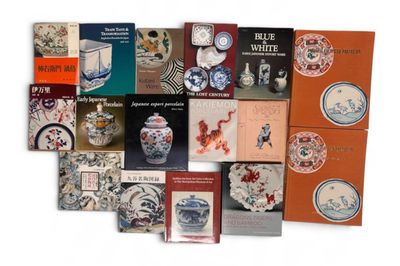 a lot of books that are sitting on a table