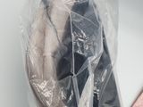 a plastic bag with a pair of shoes inside of it