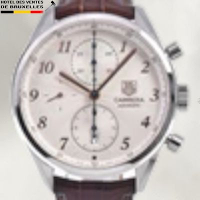 a close up of a wrist watch with a brown strap