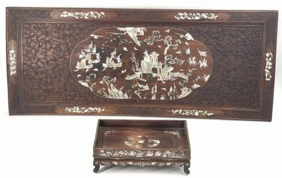 an image of a wooden table with two trays on top of it