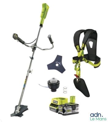 une débroussailleuse électrique verte et noire avec outils et accessoires