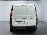 a white van that is parked in a room