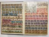 an open book with a picture of a bunch of stamps on it