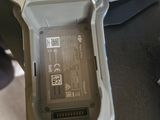 a cell phone that is sitting on top of a car seat