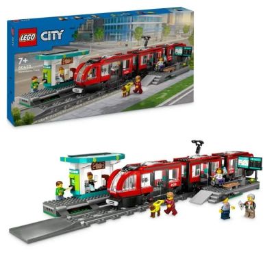 un train en Lego posé devant une boîte