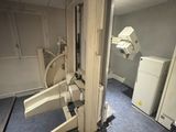 a room with a machine and a chair in it