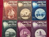 six tomes de *Miroir de monde* reliés en toile rouge