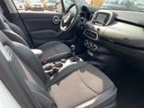 the interior of a small car with a steering wheel and dashboard