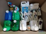 a cardboard box filled with different types of milk