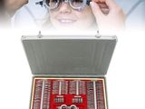 a woman that is holding a pair of glasses in front of her eye