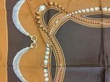 brown and white square scarf with beaded border