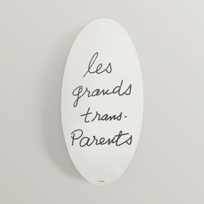 une pancarte ovale sur laquelle est écrit « les grands-parents »