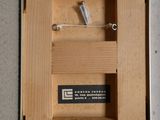 a picture of a box that has a remote in it