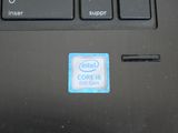 a sticker on the back of a laptop that says intel core i5