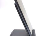 a cell phone that is sitting on top of a stand