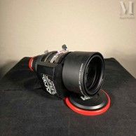 an image of a camera lens sitting on a table