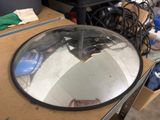 a mirror that is sitting on top of a table