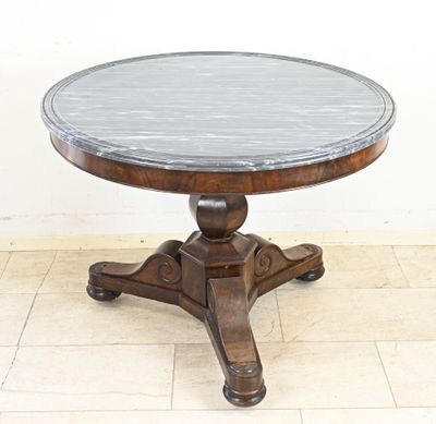 an image of a round marble top table on a wooden stand