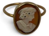 an image of a ring with a picture of a woman wearing a headdress