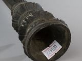 a metal pipe that has a sticker on it