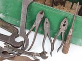 many different tools that are sitting on a table