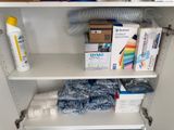 a shelf with a lot of supplies on top of it
