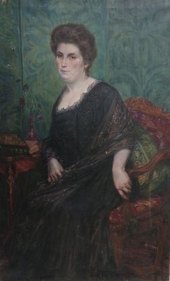 tableau représentant une femme en robe noire assise sur une chaise rouge