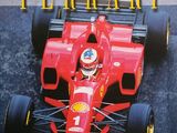 un livre dont la couverture représente une Ferrari de course