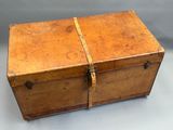 an old wooden box with two handles on it