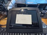 a tablet computer sitting on top of a keyboard