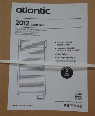 une image représentant une photo d'une brochure se trouvant dans une boîte