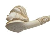 a statue of a man smoking a pipe on a white background