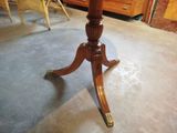 a wooden table with a glass top on it