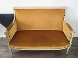 an image of a couch with a brown velvet upholstered seat