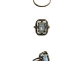 three different rings with different shapes and sizes on them