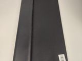a black mat with a white tag on it