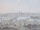 une peinture accrochée au mur d'un immeuble, représentant une vue de la ville