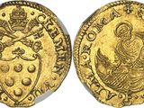 a gold coin with an image of the virgin and child on it