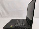 a black laptop computer sitting on a white surface