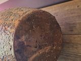 a large piece of wood hanging on the wall