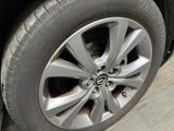 a close up of a tire on a car