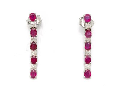 une paire de boucles d'oreilles créoles en rubis et diamants