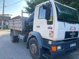 a truck that is parked on the side of the road