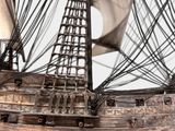 a model of a ship on display on a table