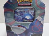 pokemon trading card game in a tin box with a picture of a blue and white pokemon character